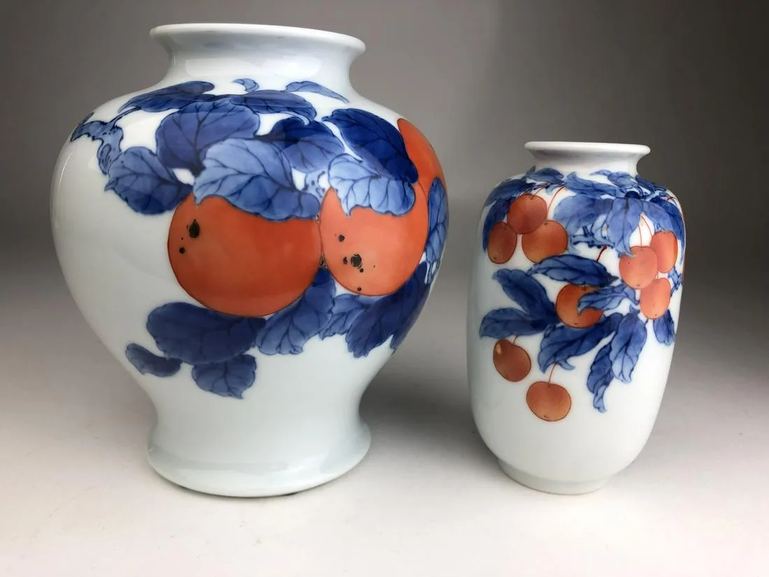Makuzu Kozan two Japanese porcelain vases. Decorated